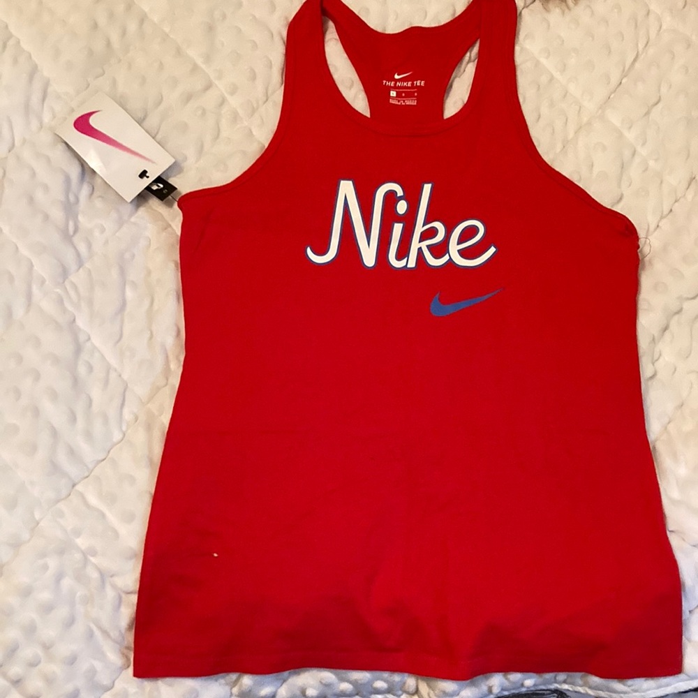 Girl’s large Nike tee. Never worn, new with tags.